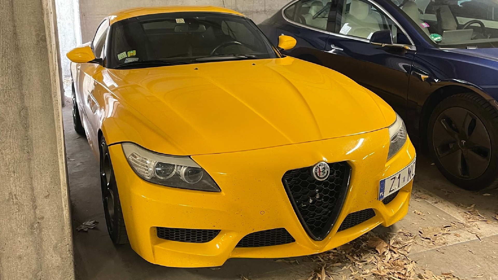 A special BMW Z4 with Alfa Romeo grille and wheels was found hiding in the parking lot of Villa D'Este.