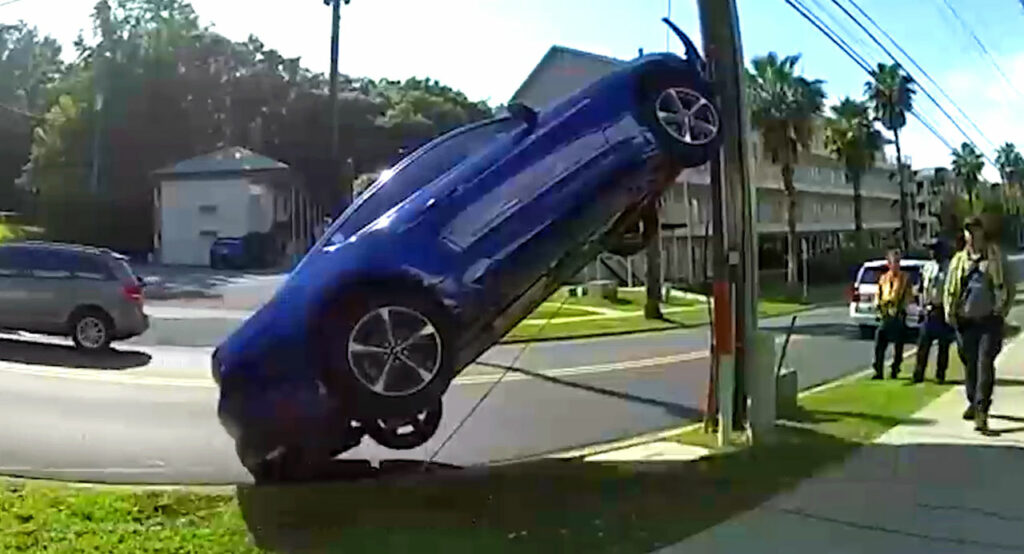 Influenced, the Florida man lifted the Mustang and drove the electric pole