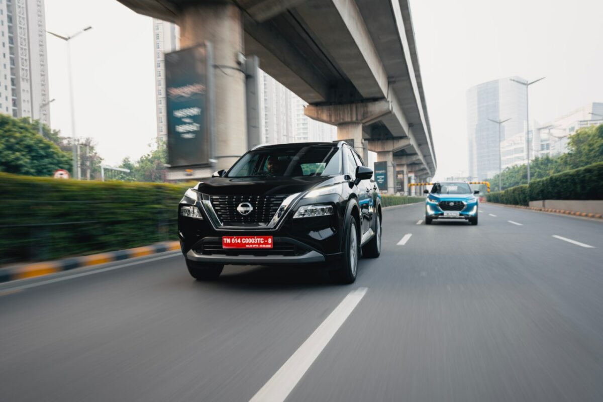 New Nissan X trail Review Image Front Action Shot Magnite in Background